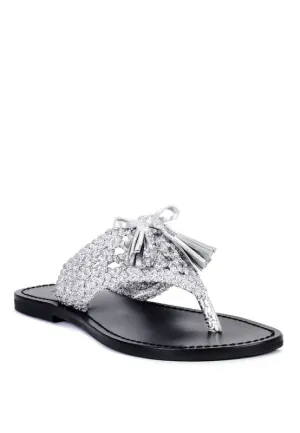 HANDWOVEN NATURAL SUEDE TASSEL THONG FLATS