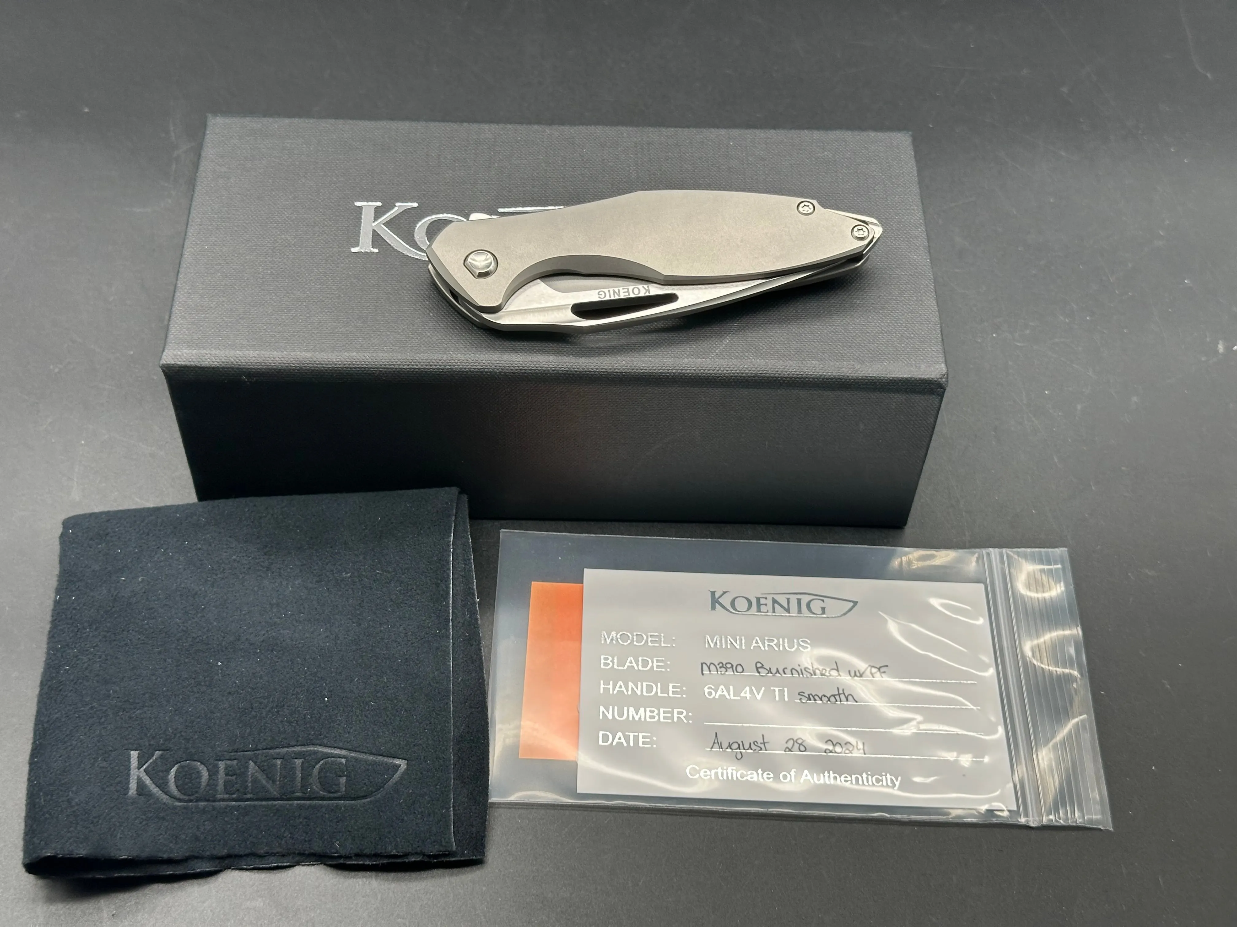 Koenig Mini Arius, M390 Blade - Burnished with Polished Flats, Smooth Ti Handles